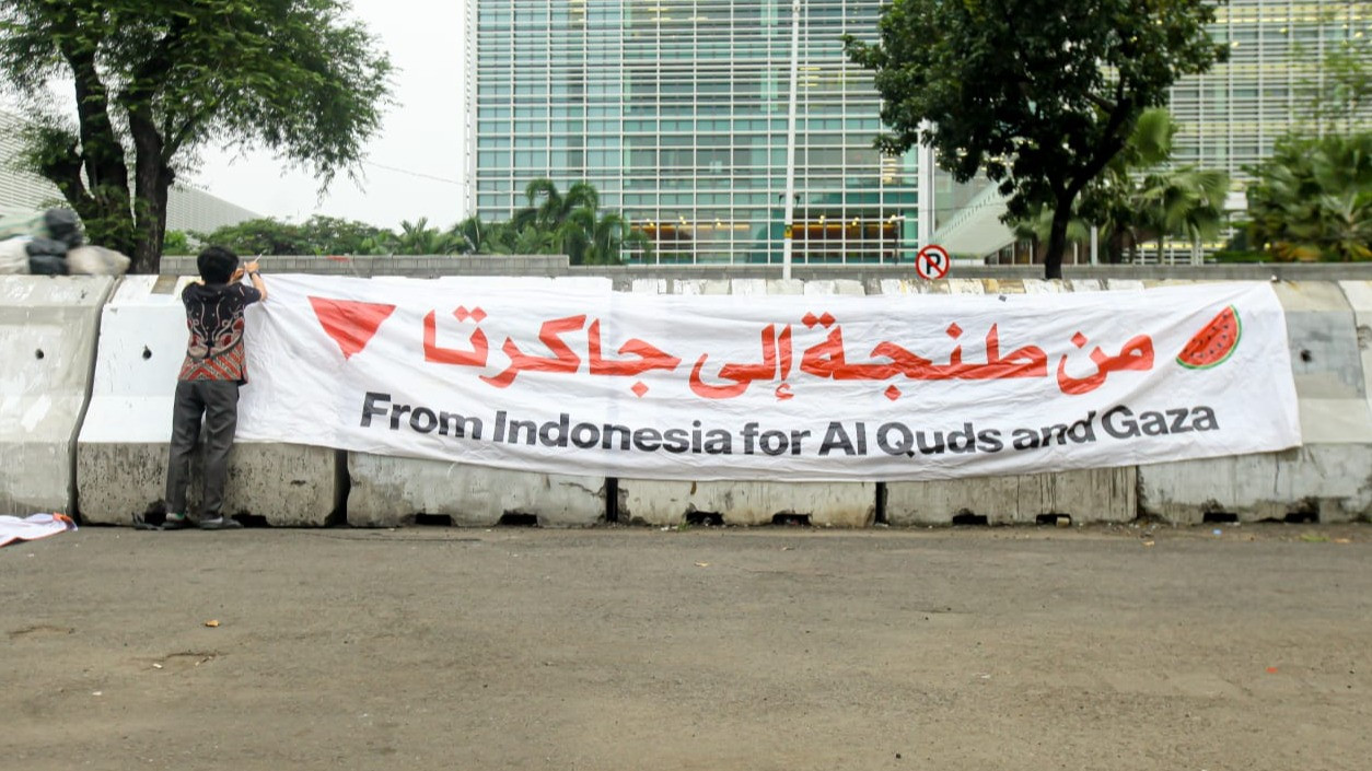 Berita Foto: Aksi Desak Hentikan Genosida dan Akui Kemerdekaan Palestina
            - galeri foto